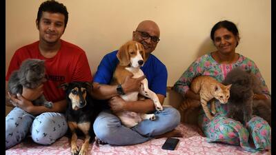 The Khots with the abandoned animals that they have been caring for at their home in Kharghar. (BACHCHAN KUMAR/HT PHOTO) The Khots with the abandoned animals that they have been caring for at their home in Kharghar. (BACHCHAN KUMAR/HT PHOTO)