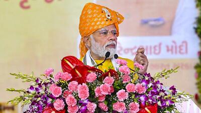Prime Minister Narendra Modi during the foundation stone laying of multiple projects of Sabar Dairy at Gadhoda Chowki in Sabarkantha, Gujarat, on Thursday. (PTI)