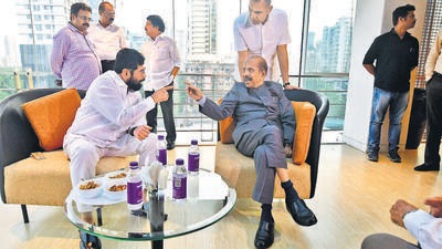 Chief minister Eknath Shinde with veteran Shiv Sena leader Manohar Joshi on Thursday Bhushan Koyande/HT Photo Chief minister Eknath Shinde with veteran Shiv Sena leader Manohar Joshi on Thursday Bhushan Koyande/HT Photo