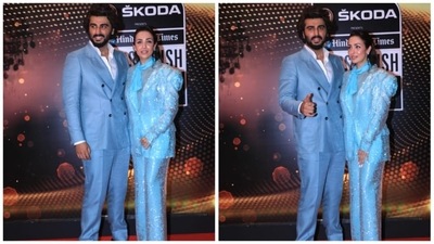 For the occasion, Arjun Kapoor and Malaika Arora twinned in fancy blue outfits. While the former looked dapper in a blue pantsuit, the latter stunned in a dazzling blue pantsuit. (HT Photo/Varinder Chawla) For the occasion, Arjun Kapoor and Malaika Arora twinned in fancy blue outfits. While the former looked dapper in a blue pantsuit, the latter stunned in a dazzling blue pantsuit. (HT Photo/Varinder Chawla)