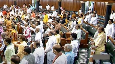 BJP members protest in the Lok Sabha during ongoing Monsoon Session of Parliament in New Delhi on Thursday. (PTI)
