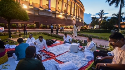 AAP MP Sanjay Singh and other MPs, suspended from the Rajya Sabha, during a sit-in protest at Parliament House complex in New Delhi.- (PTI) AAP MP Sanjay Singh and other MPs, suspended from the Rajya Sabha, during a sit-in protest at Parliament House complex in New Delhi.- (PTI)