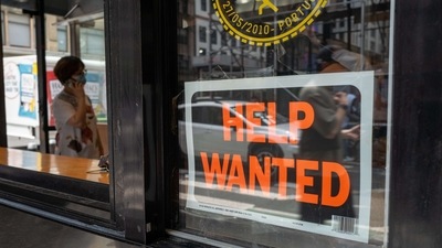 A ‘help wanted' sign is displayed in a window in Manhattan. (AFP) A ‘help wanted' sign is displayed in a window in Manhattan. (AFP)