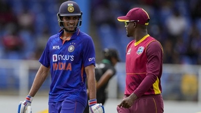 Shubman Gill and Shamarh Brooks leave the field as rain stops during the third ODI (AP) Shubman Gill and Shamarh Brooks leave the field as rain stops during the third ODI (AP)