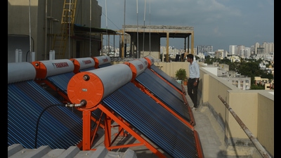 Solar panels at a society in Wadgaonsheri. (Shankar Narayan/HT PHOTO)