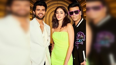 In another picture, Karan Johar put on his funky black sunglasses with purple rims and posed with Ananya Panday and Vijay Devarakonda. (Instagram/@ananyapanday) In another picture, Karan Johar put on his funky black sunglasses with purple rims and posed with Ananya Panday and Vijay Devarakonda. (Instagram/@ananyapanday)