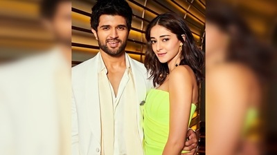 Ananya Panday donned a neon green strapless corset-inspired body-hugging dress while Vijay Devarakonda looked dapper in an all-white suit. (Instagram/@ananyapanday) Ananya Panday donned a neon green strapless corset-inspired body-hugging dress while Vijay Devarakonda looked dapper in an all-white suit. (Instagram/@ananyapanday)