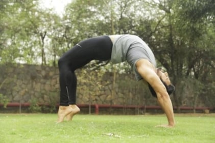 Upward bow or wheel pose (Chakrasana)&nbsp; (HTPHOTO)