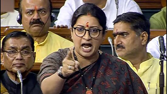 Union minister Smriti Irani in the Lok Sabha on Thursday. (PTI Photo)