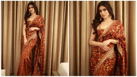 Bengali Beauty Mouni Roy sure knows all the spells to leave her fans enchanted with her dreamy looks in different attires. The actor has lately been making a lot of headlines for her role in the film Brahmastra. Leaving the fashion gods spellbound, Mouni posed like a diva in this rustic coloured printed Kantha saree.(Instagram/@imouniroy)