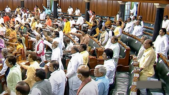 BJP members protest in the Lok Sabha during ongoing Monsoon Session of Parliament in New Delhi on Thursday.(PTI)