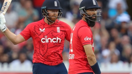 England's Jonny Bairstow (L) celebrates after scoring a half-century (50 runs) as teammate Moeen Ali looks on during the first T20 international cricket match between England and South Africa at Bristol County Ground.(AFP)