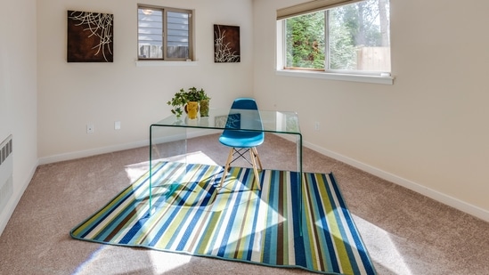 5. Patterned Rug for Neutral Palette of Room - If you have a neutral and subtle pattern room decor, bold patterned rugs look visually pleasing and add a sense of character to your living room. It will add an immersive texture to your room instantly.&nbsp;(Photo by Francesca Tosolini on Unsplash)