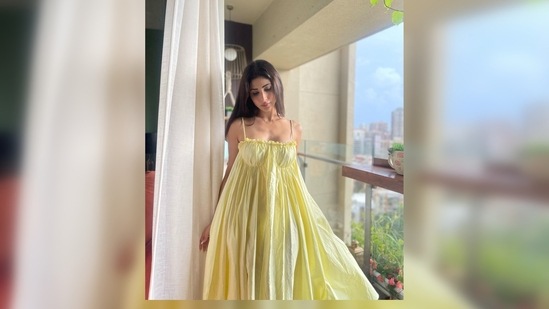 Not all stylish outfits are comfortable and if you find something that is both trendy and super comfy then it is like hitting the jackpot. Sharing her latest home photoshoot stills on her Instagram handle, Mouni Roy captioned her post, "Bloom baby bloom."(Instagram/@imouniroy)