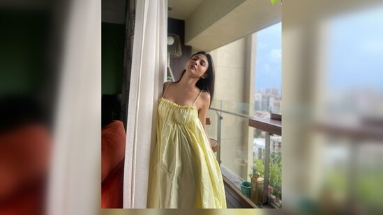 Mouni Roy, who is often seen making stylish statements with her sartorial fashion choices, proved once again that she can ace any look effortlessly in this simple yet beautiful yellow slip summer dress.(Instagram/@imouniroy)