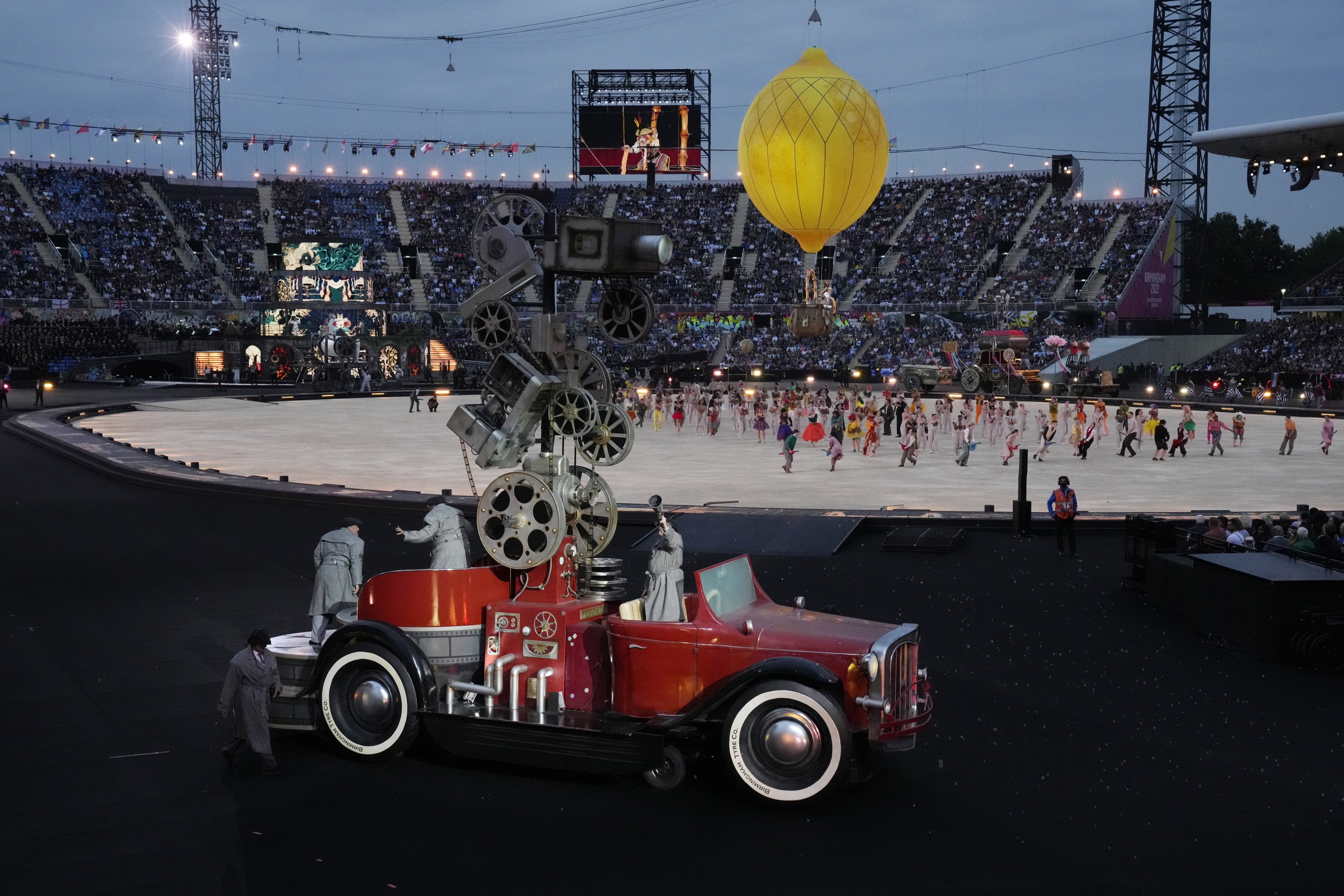 Actors perform during the Commonwealth Games opening ceremony at the Alexander stadium in Birmingham, England, Thursday, July 28, 2022.&nbsp; (AP)
