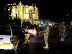 Taliban fighters stand guard at the site of an explosion in front of the Kabul International Cricket Stadium, in Kabul, Afghanistan. Taliban fighters stand guard at the site of an explosion in front of the Kabul International Cricket Stadium, in Kabul, Afghanistan.