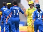 IND-W vs AUS-W: Australia's Ash Gardner (2R) celebrates after beating India.(AFP)