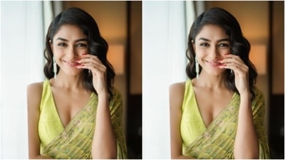 Mrunal slipped into a green printed saree which featured prints in shades of green and white. (Instagram/@mrunalthakur)