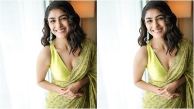 In statement silver earrings from the shelves of Amrapali Jewels, Mrunal further accessorised her ethnic look for the day. Styled by hairstylist Deepali Dilip Deokar, Mrunal wore her tresses into soft wavy curls as she posed for the indoor photoshoot. (Instagram/@mrunalthakur)