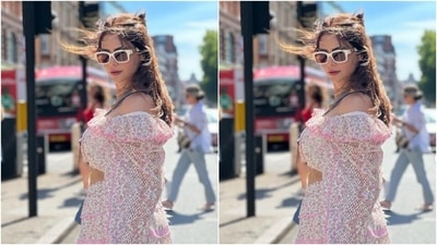 Aamna decked up in a white cropped top intricately decorated ted in pink floral patterns and pink zari. The top also featured quarter sleeves in perforated fabric. Aamna paired her top with a short white skirt featuring the same designs and layering it with pink zari details. (Instagram/@aamnasharifofficial)