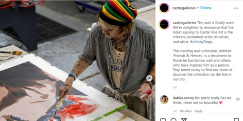 An image of Johnny Depp working on Bob Dylan artwork.