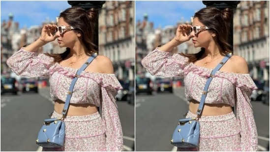 Aamna played muse to fashion designer house LoveshackFancy and picked a printed co-ord set for her day out with the sun.(Instagram/@aamnasharifofficial)
