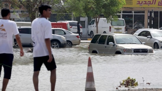 A flooded street is pictured in the UAE's Fujairah emirate following heavy rainfall on Friday.&nbsp;(AFP)