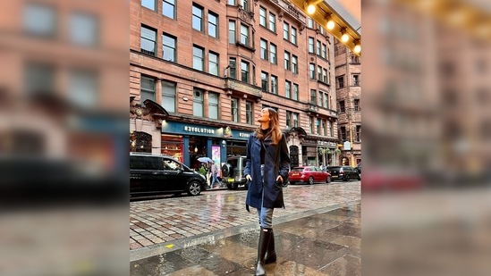Manushi Chhillar donned a black turtle neck which she teamed with denim, a blue trench coat and black boots.(Instagram/@manushichhillar)