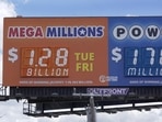 A sign displays the Mega Millions lottery jackpot in Detroit. A sign displays the Mega Millions lottery jackpot in Detroit. 