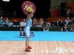 Weightlifter Mirabai Chanu in action as she wins Gold in the Women's 49kg Finals at CWG 2022