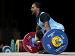 India's Gururaja Gururaja in action during the Mens 61kg weightlifting