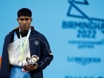Commonwealth Games 2022: Silver medallist India's Sanket Mahadev Sargar celebrates on the podium(REUTERS)