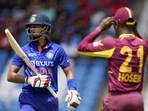 India's Shreyas Iyer&nbsp;leaves the field, caught by West Indies' Akeal Hosein, during the first T20 cricket match at Brian Lara Cricket Academy in Tarouba, Trinidad and Tobago