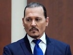 Johnny Depp and Amber Heard during their defamation trial in a US court. Johnny Depp and Amber Heard during their defamation trial in a US court.