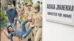 Police personnel detain an ABVP supporter during a protest outside Karnataka home minister Araga Jnanendra in Bengaluru on Saturday (ANI) Police personnel detain an ABVP supporter during a protest outside Karnataka home minister Araga Jnanendra in Bengaluru on Saturday (ANI)