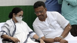 West Bengal Chief Minister Mamata Banerjee interacts with State Minister Firhad Hakim as she visits to watch the preparation of matyers' Day celebration Rally of TMC Party, in Kolkata on July 20.