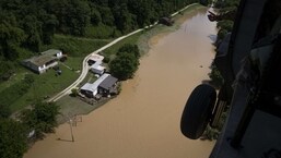In this aerial view, floodwater can be seen as the Kentucky National Guard fly a recon and rescue mission.