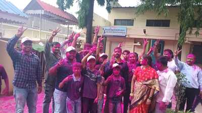After the news of Sanket Sargar’s podium finish reached his hometown in Sangli, relatives celebrated by distributing sweets and playing with gulal on Saturday afternoon. (HT PHOTO) After the news of Sanket Sargar’s podium finish reached his hometown in Sangli, relatives celebrated by distributing sweets and playing with gulal on Saturday afternoon. (HT PHOTO)