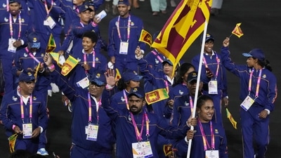 Athletes of Sri Lanka enter the stadium during the Commonwealth Games opening ceremony at the Alexander stadium in Birmingham, England, (AP) Athletes of Sri Lanka enter the stadium during the Commonwealth Games opening ceremony at the Alexander stadium in Birmingham, England, (AP)