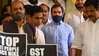 Rahul Gandhi along with other MPs of Congress party in a protest against price hike of essential commodities and implementation of Goods and Services Tax (GST) on milk related food products at the parliament in New Delhi on July 27, 2022. (Photo by Prakash SINGH / AFP) (AFP) Rahul Gandhi along with other MPs of Congress party in a protest against price hike of essential commodities and implementation of Goods and Services Tax (GST) on milk related food products at the parliament in New Delhi on July 27, 2022. (Photo by Prakash SINGH / AFP) (AFP)