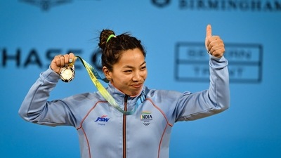 India's Mirabai Chanu with the gold medal after winning women's 49kg weightlifting category match of the Commonwealth Games 2022 (PTI) India's Mirabai Chanu with the gold medal after winning women's 49kg weightlifting category match of the Commonwealth Games 2022 (PTI)