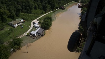 In this aerial view, floodwater can be seen as the Kentucky National Guard fly a recon and rescue mission. (AFP) In this aerial view, floodwater can be seen as the Kentucky National Guard fly a recon and rescue mission. (AFP)