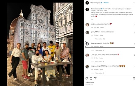 Yash poses with fans.