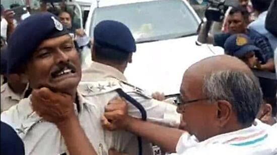 A scuffle was reported between police and Congress leader Digvijaya Singh amid charges of poaching and defection in Madhya Pradesh zila panchayat polls. (ANI)
