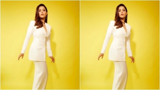 Nushrratt teamed her blazer with a pair of white formal trousers with wide legs.(Instagram/@nushrrattbharuccha)