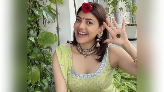 You can take inspiration from Kajal Agarwal's look and go for a printed lime green anarkali kurta with a matching dupatta. Mang tika and bindi can elevate any Indian outfit. Look for jewellery in contrasting colours. For light green kurtas, you can pair it up with heavy gold jewellery. Try to keep your hair and makeup minimal.(instagram)