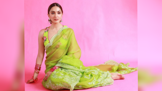 Considering the humid weather if you want to wear something airy, simple yet unique, then choose a saree similar to Kiara Advani's. The net saree with the green light colour print is the ideal choice for Hariyali Teej. Pair it up with a matching sleeveless printed blouse to complete the look. Keep your hair up in a bun or ponytail. A little bindi, blushed cheeks, and nude makeup can work wonders. Add trendy silver jhumkas and glass bangles to complete the look.(Instagram )