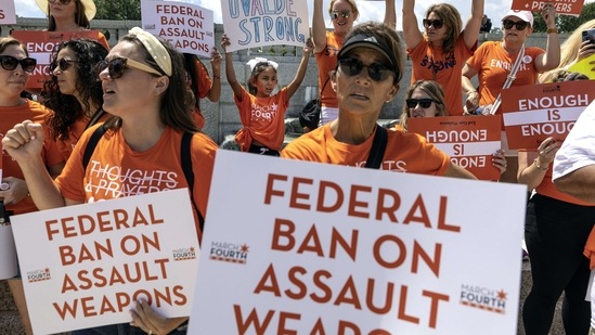 Gun control activists rally near the U.S. Capitol calling for a federal ban on assault weapons on July 13, 2022 in Washington, DC.(AFP)