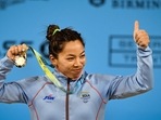Birmingham: India's Mirabai Chanu with the gold medal after winning women's 49kg weightlifting category match of the Commonwealth Games 2022 (CWG), in Birmingham, UK, Saturday, July 30, 2022. (PTI Photo/Swapan Mahapatra)(PTI07_30_2022_000336B)
